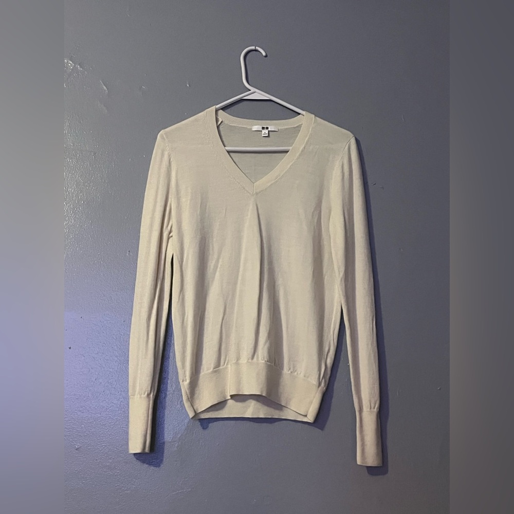 Used cream color v neck for women size small